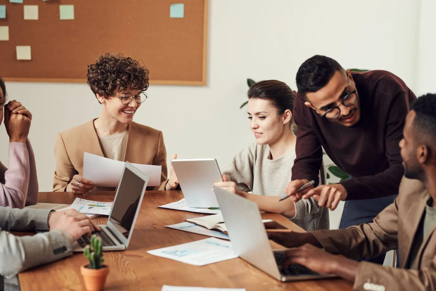 Flexus culture — teammates connecting in a bright workspace