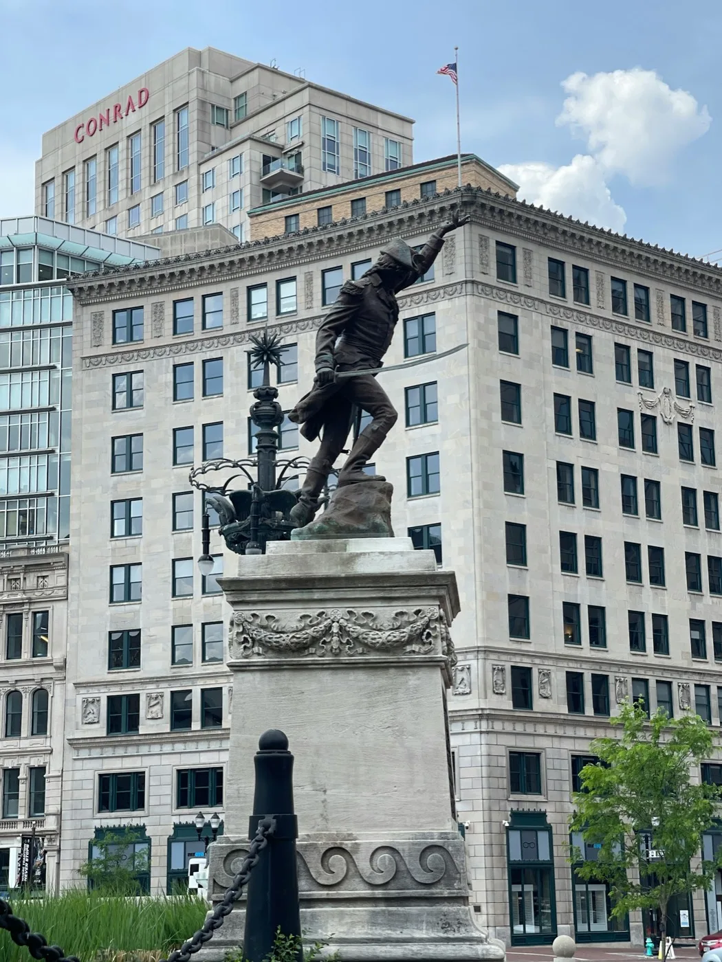 Historic bronze statue and buildings in downtown Indianapolis