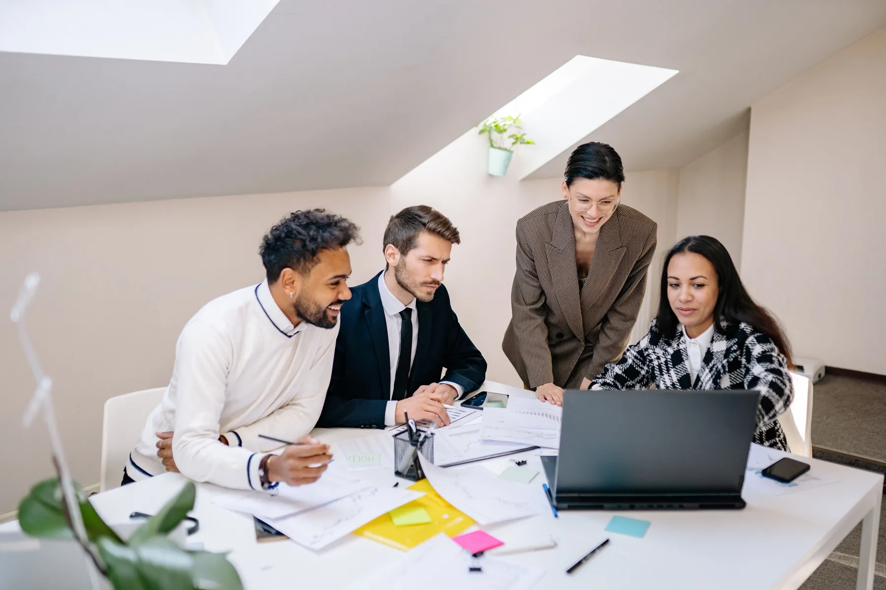 Four Flexus colleagues aligning on a project plan
