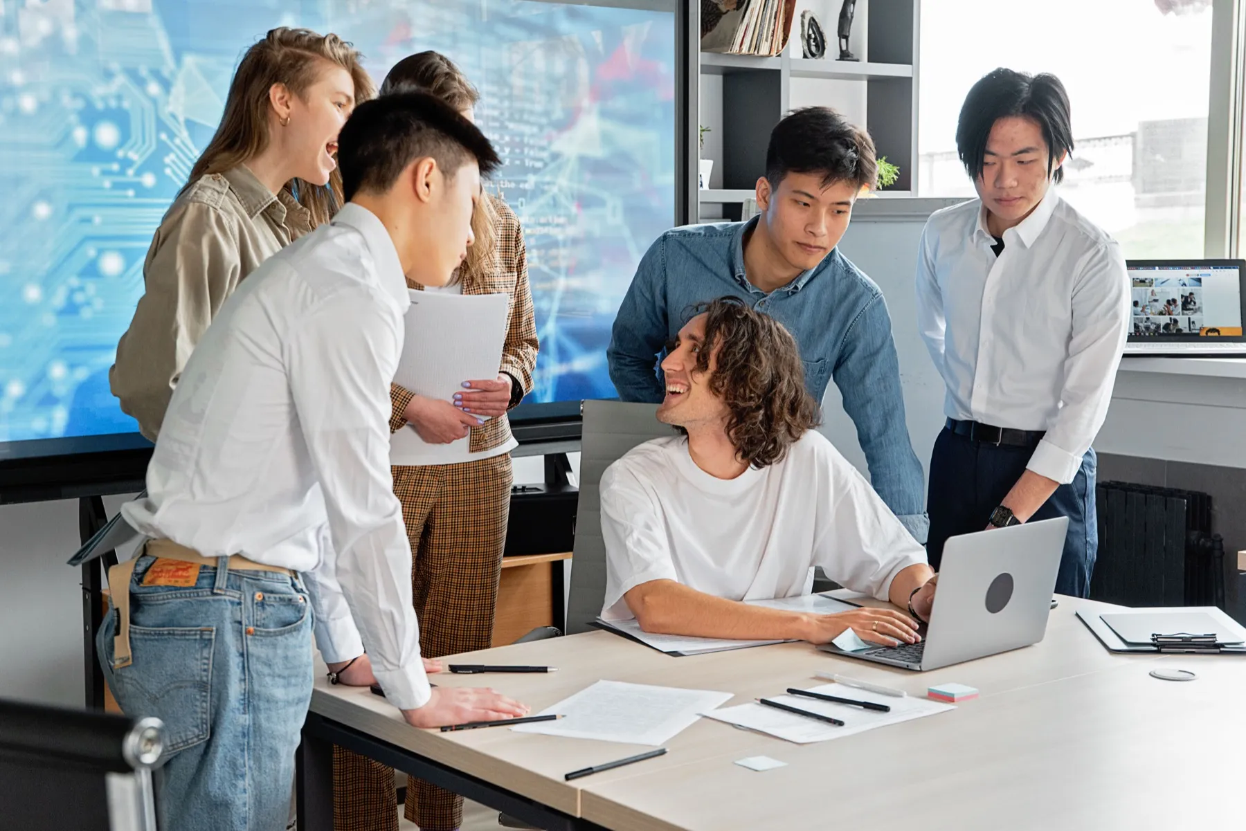 Cross-functional Flexus team in a conference room workshop