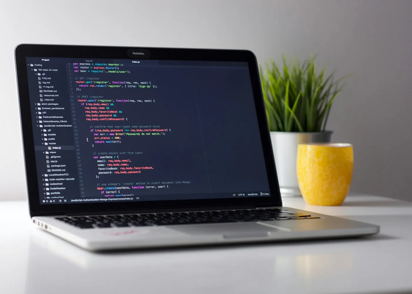 Engineers pair-programming a production feature