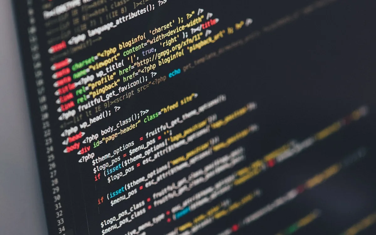 Software engineer writing code on a monitor during a development sprint
