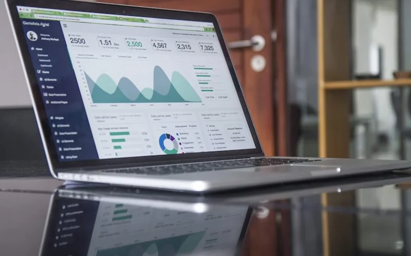 Analyst refining website performance and conversion data on screen