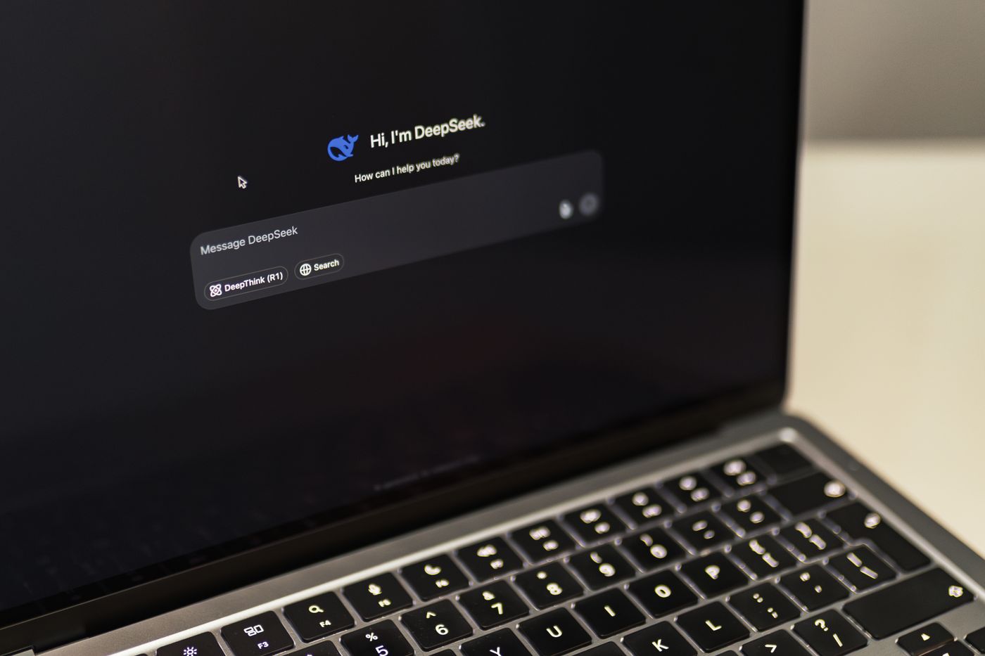 Laptop showing an AI chatbot interface