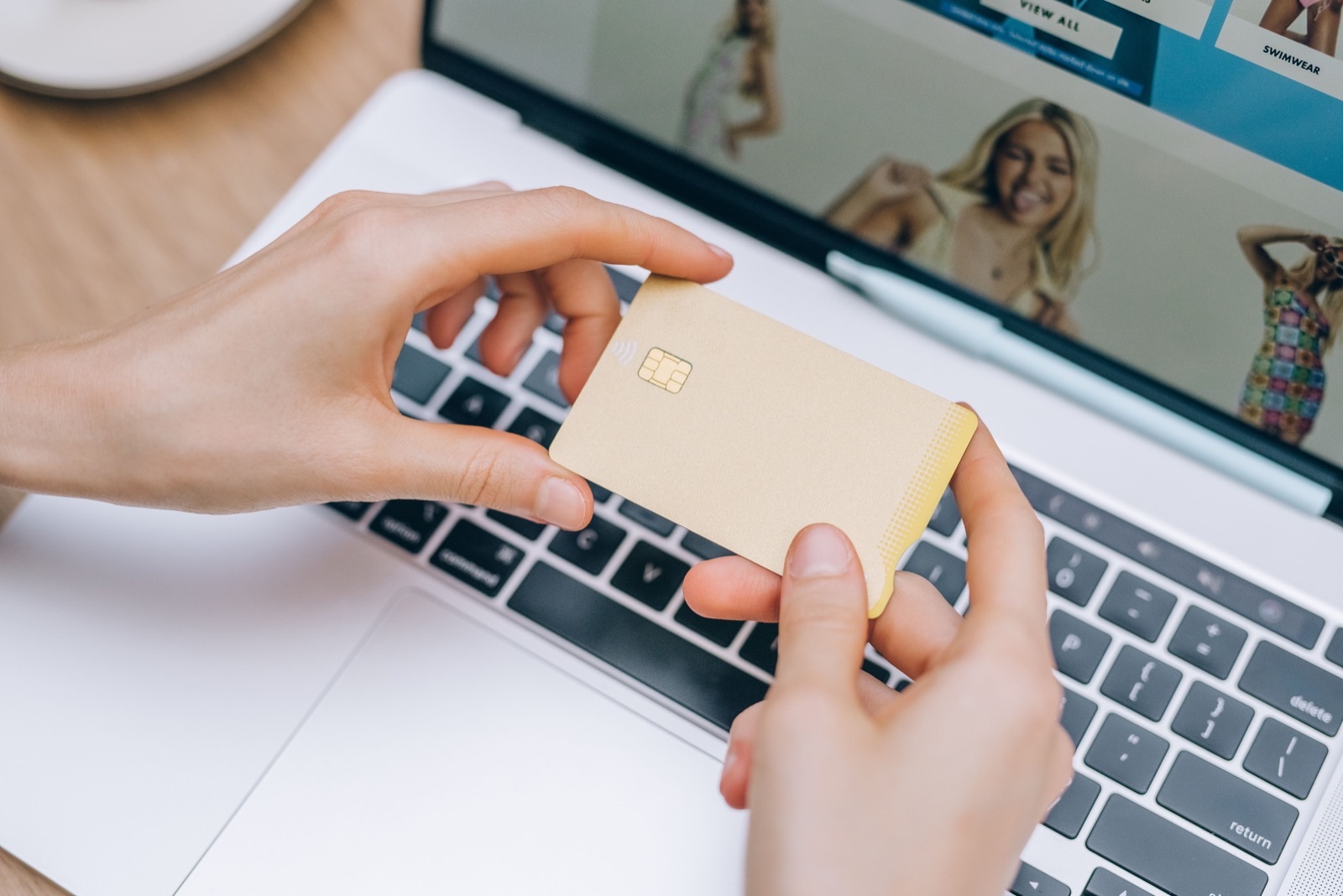 Credit card and laptop for a payments portal project