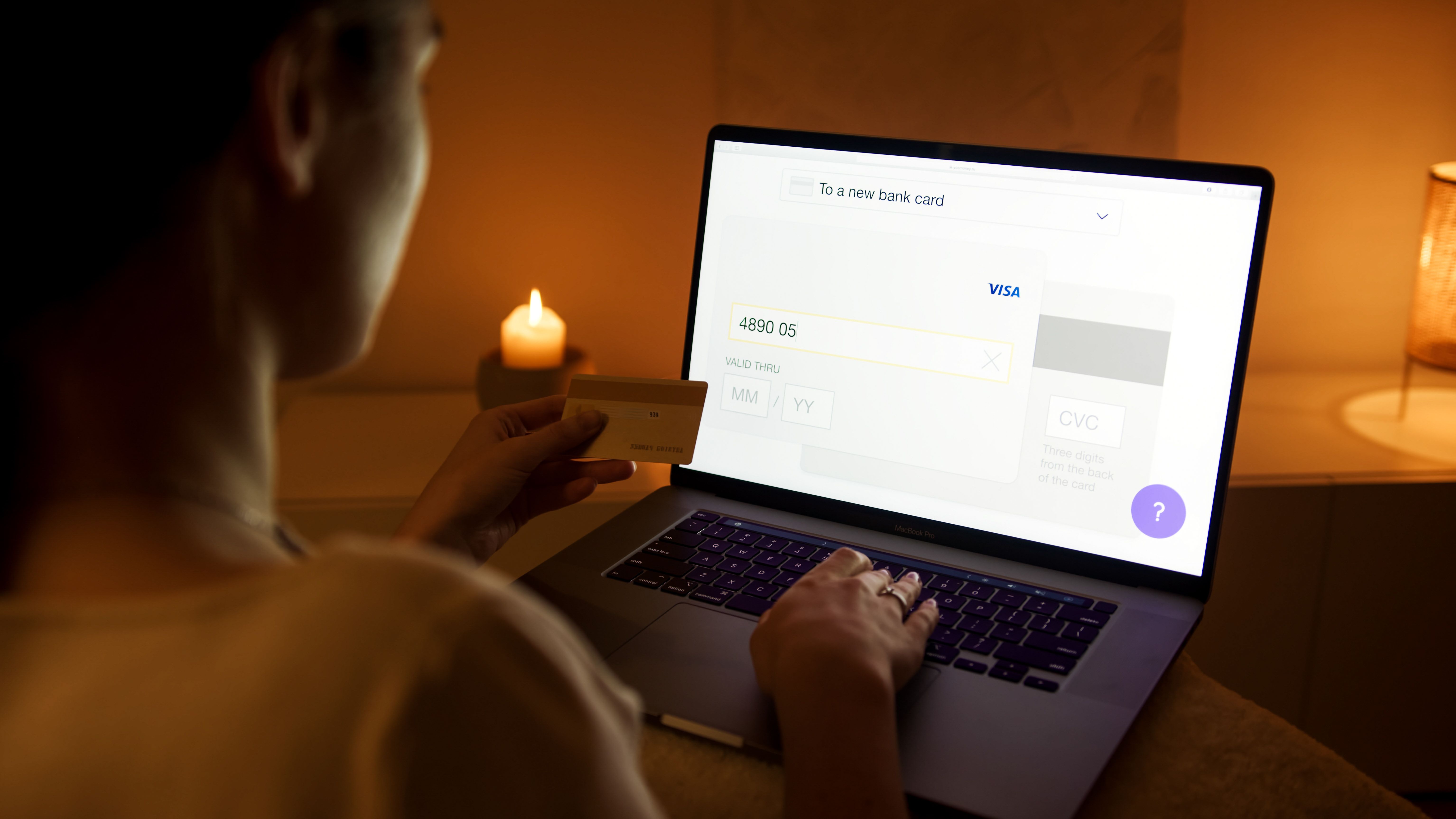 Secure online payment testing with laptop and credit card