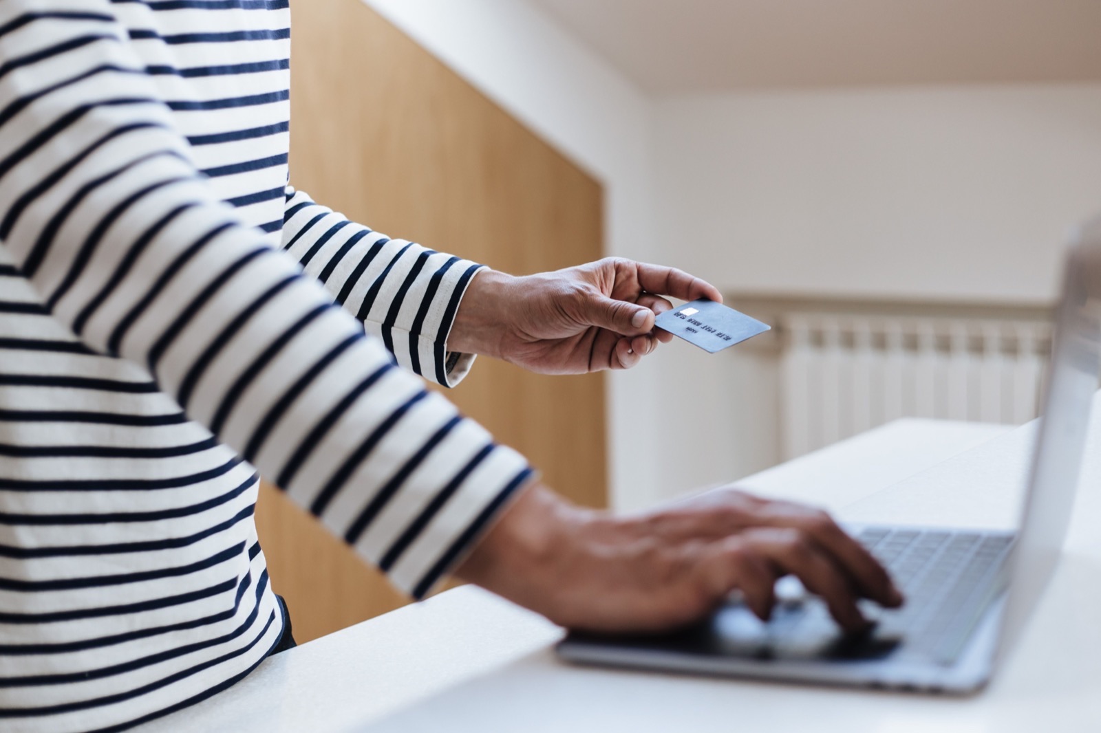 Online payment with credit card on a laptop