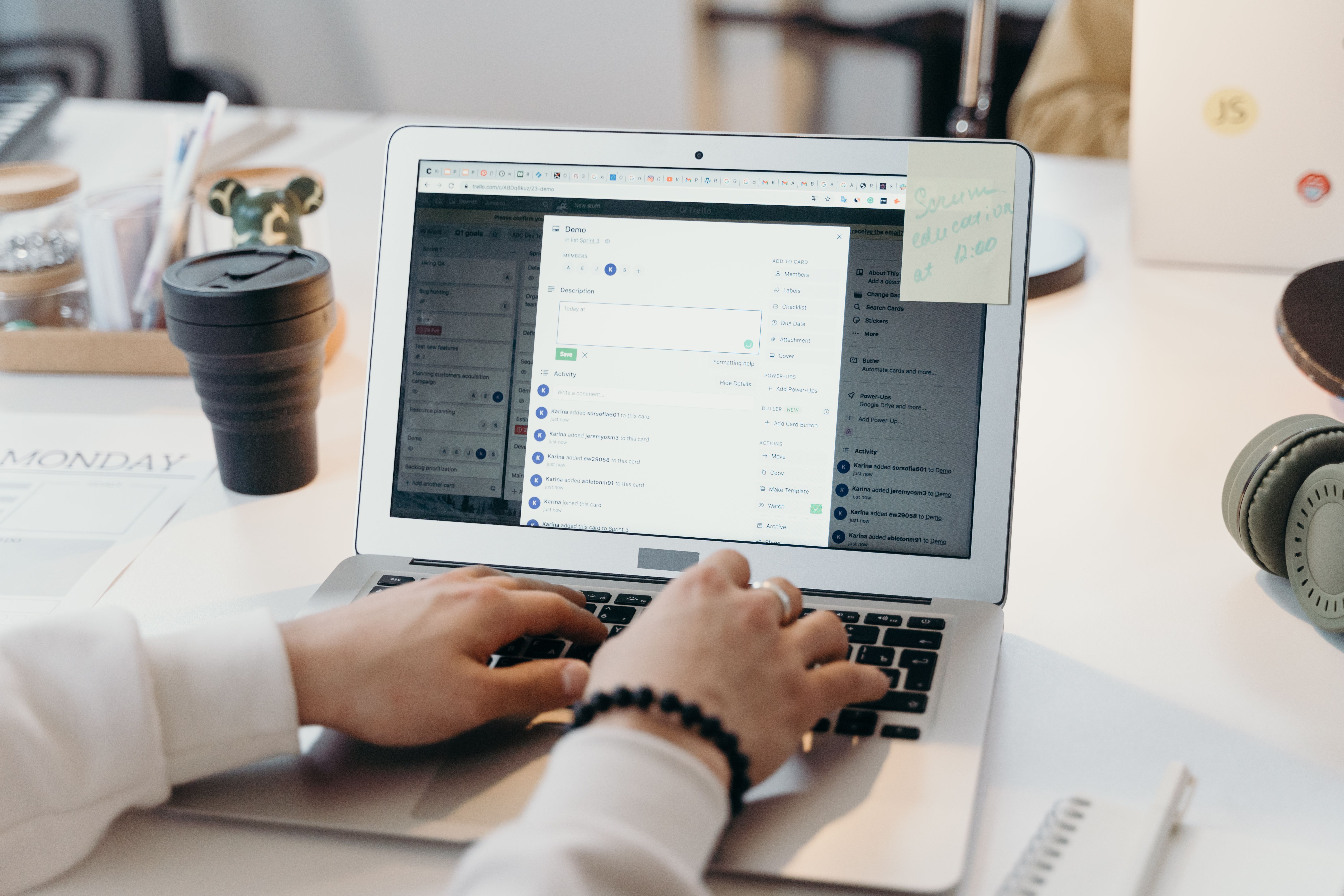 Hands typing an email campaign on a laptop