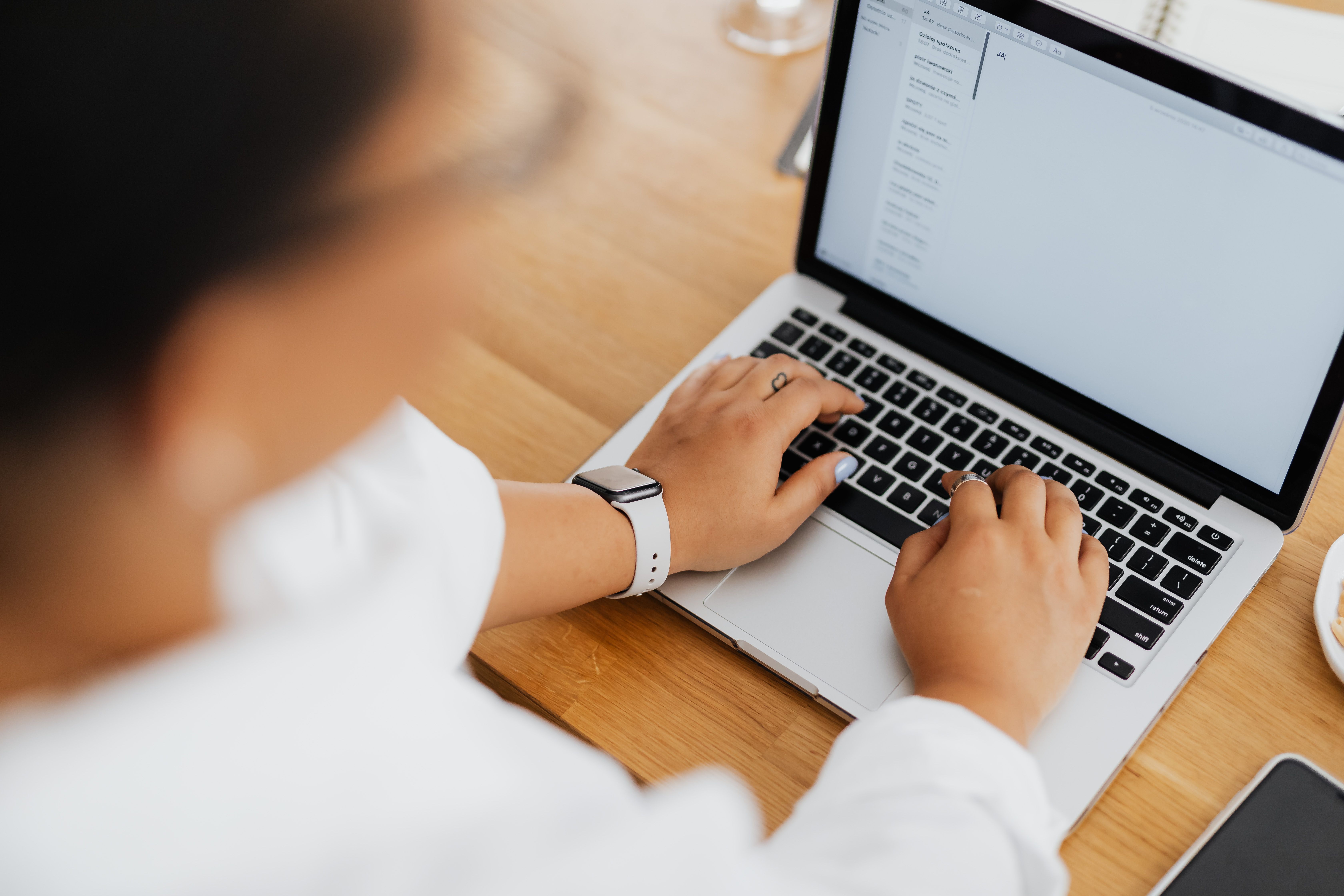 Close-up of keyboard during email content editing