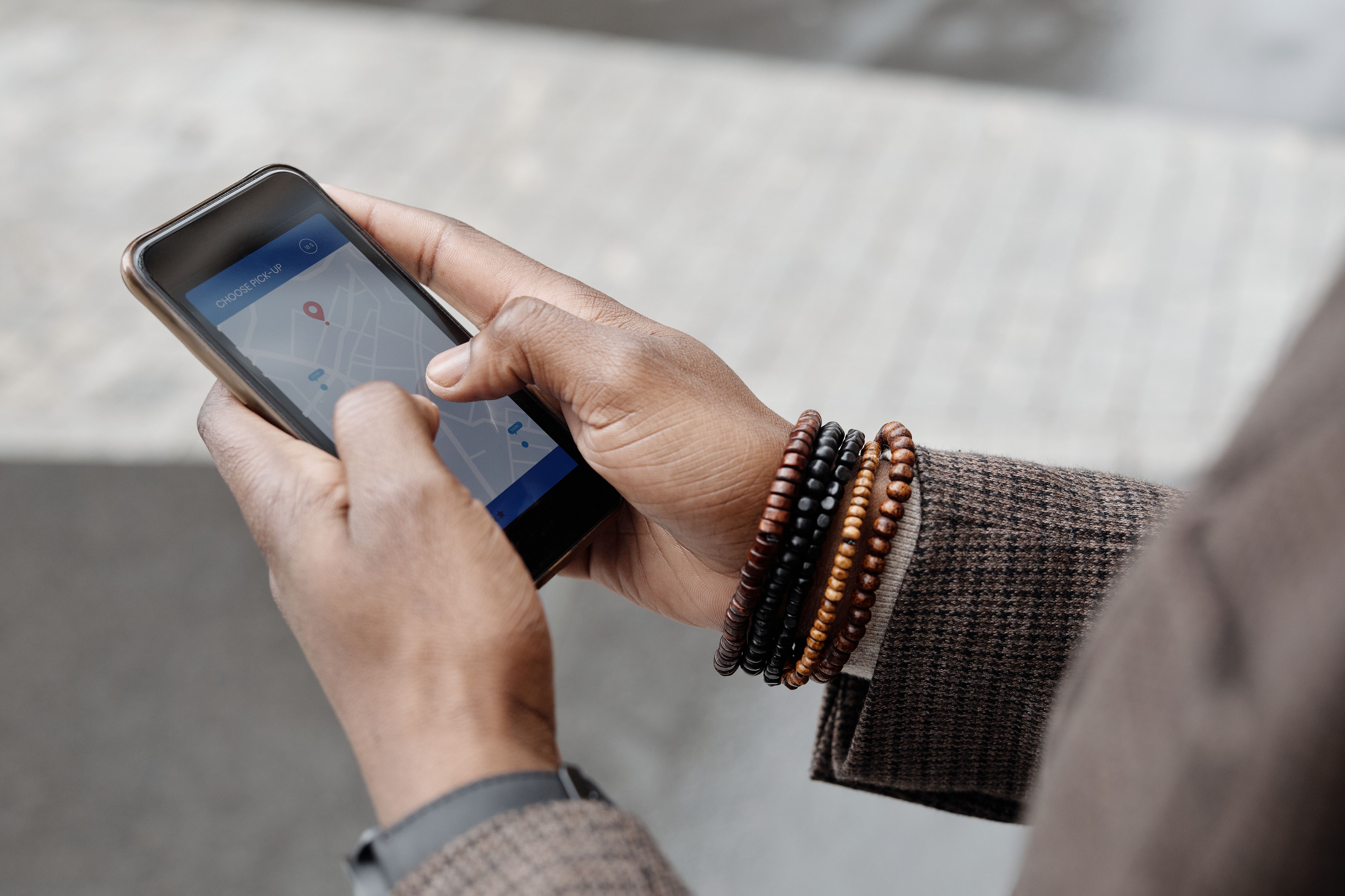Customer using a phone map app to find a nearby business