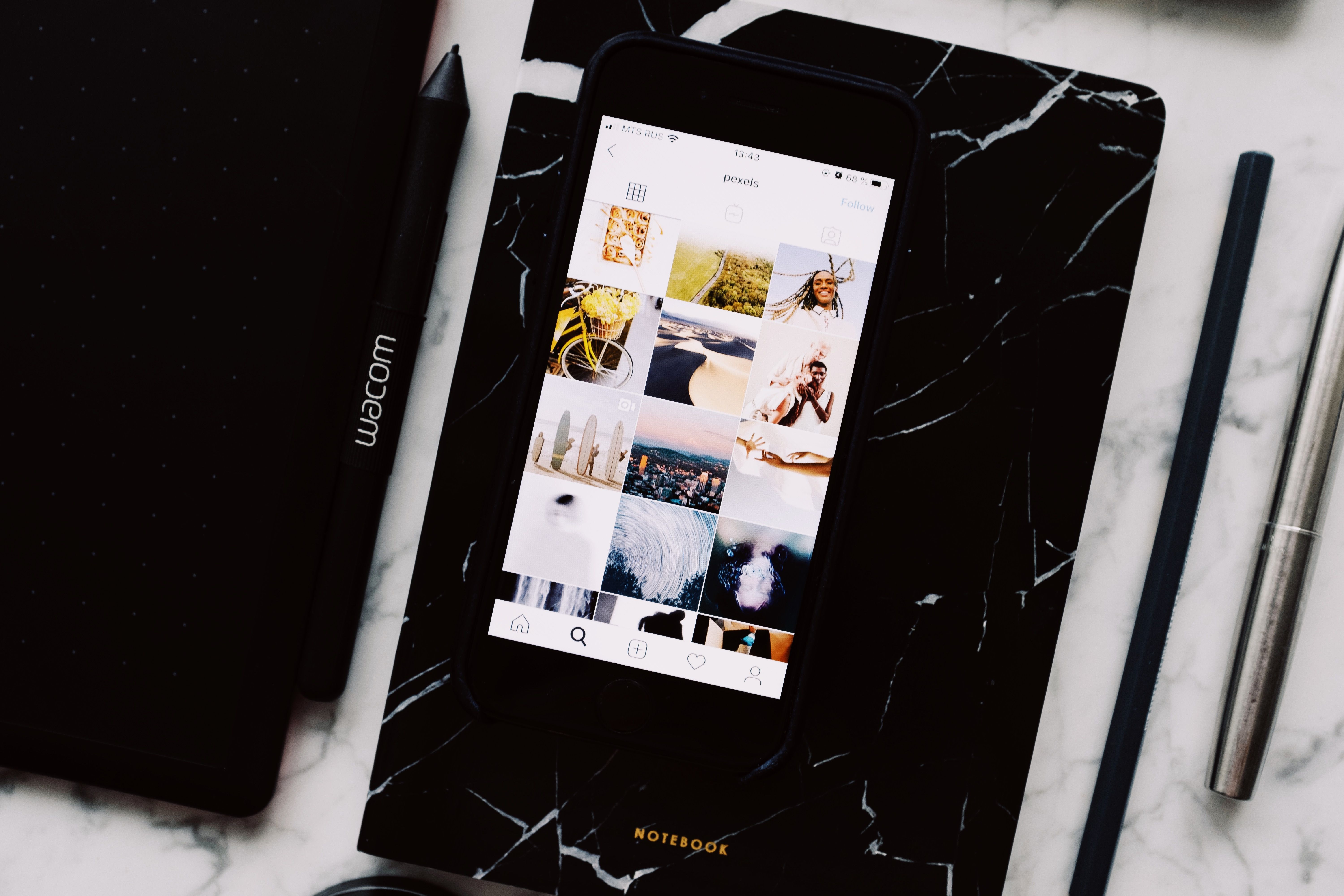 Smartphone and notebook used for social content planning