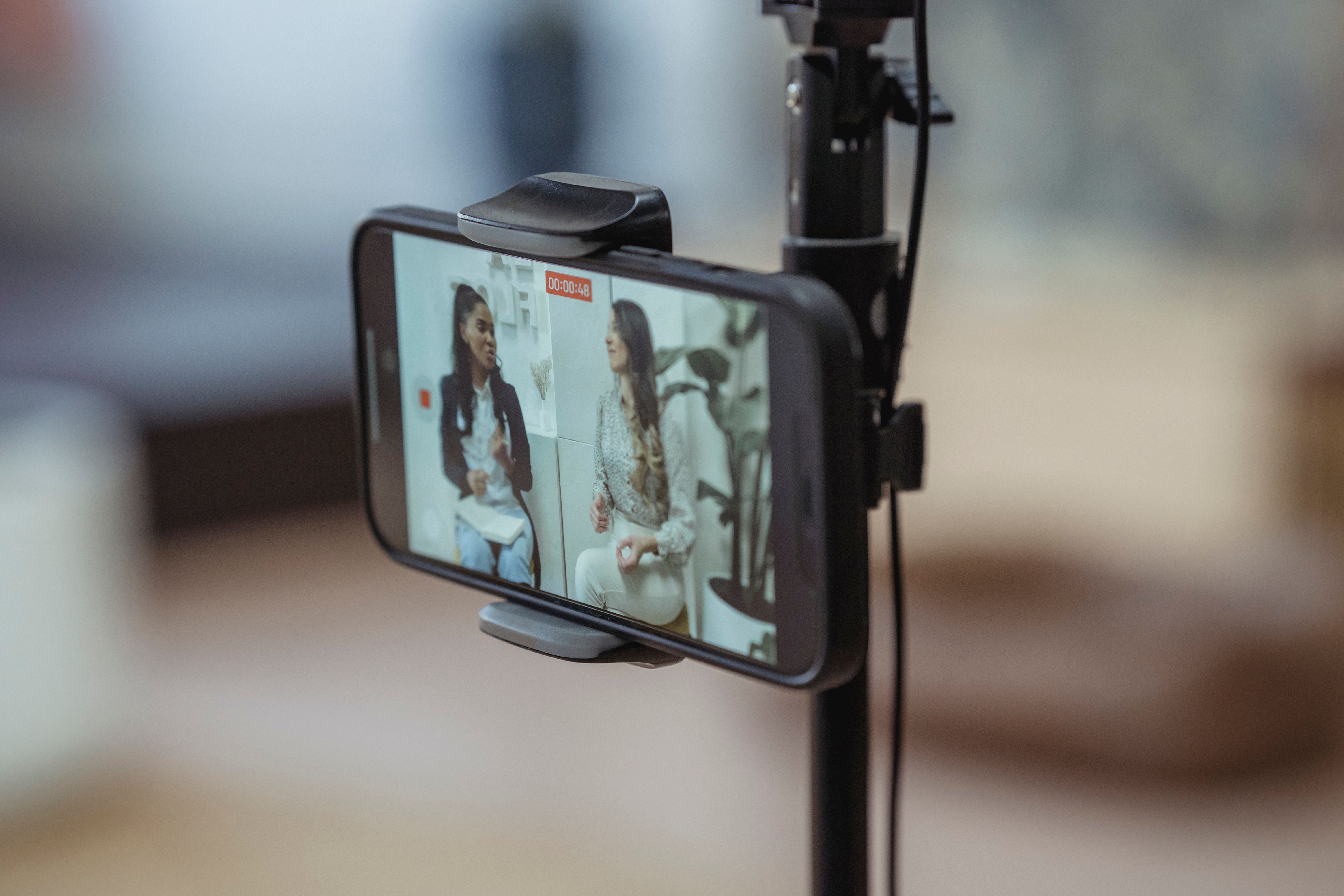 Team recording social media video content indoors