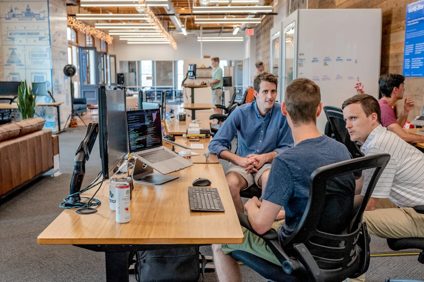 Cross-functional Flexus team reviewing industry messaging and funnel maps