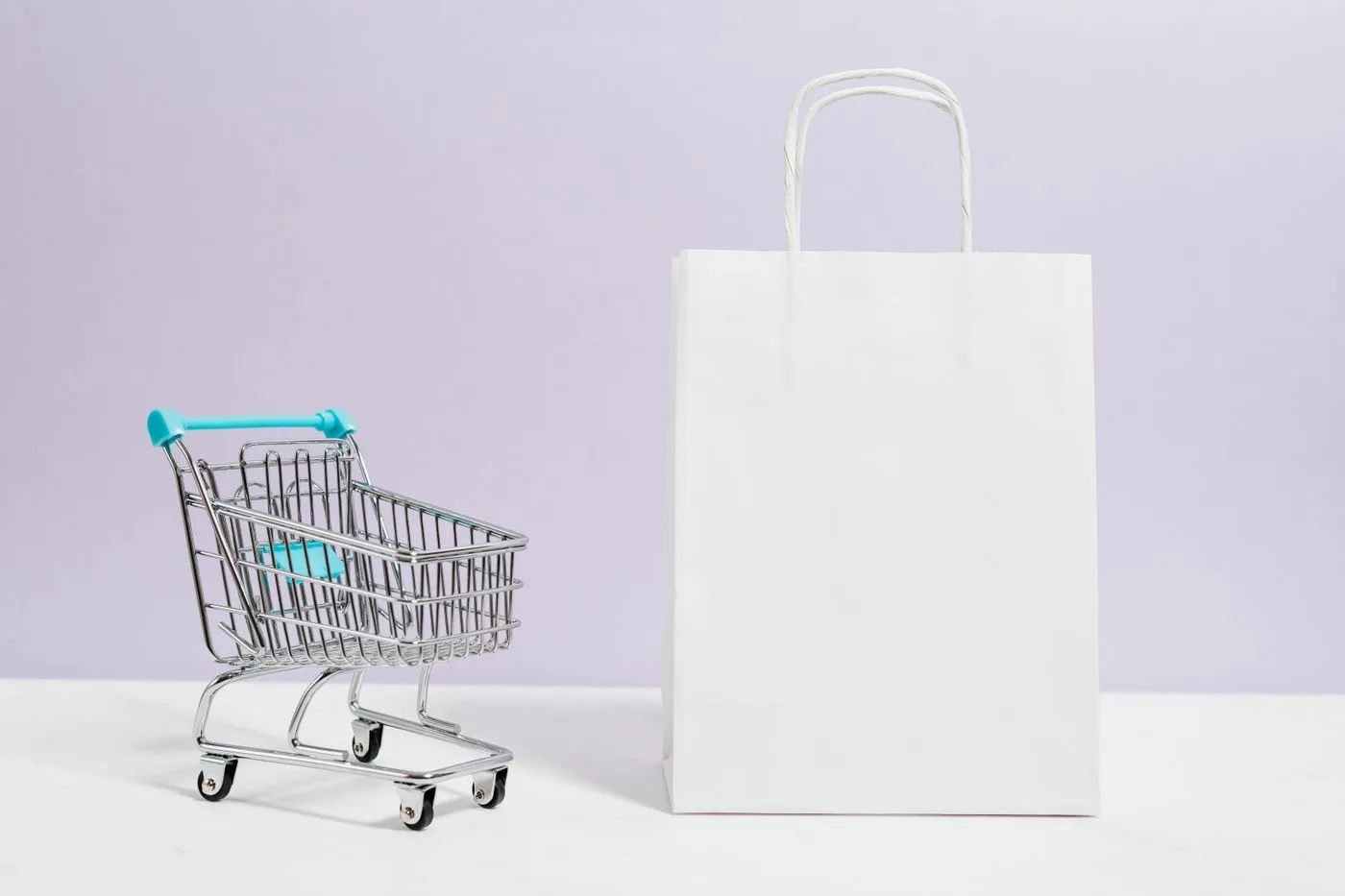 Ecommerce team optimizing product pages and checkout on laptops