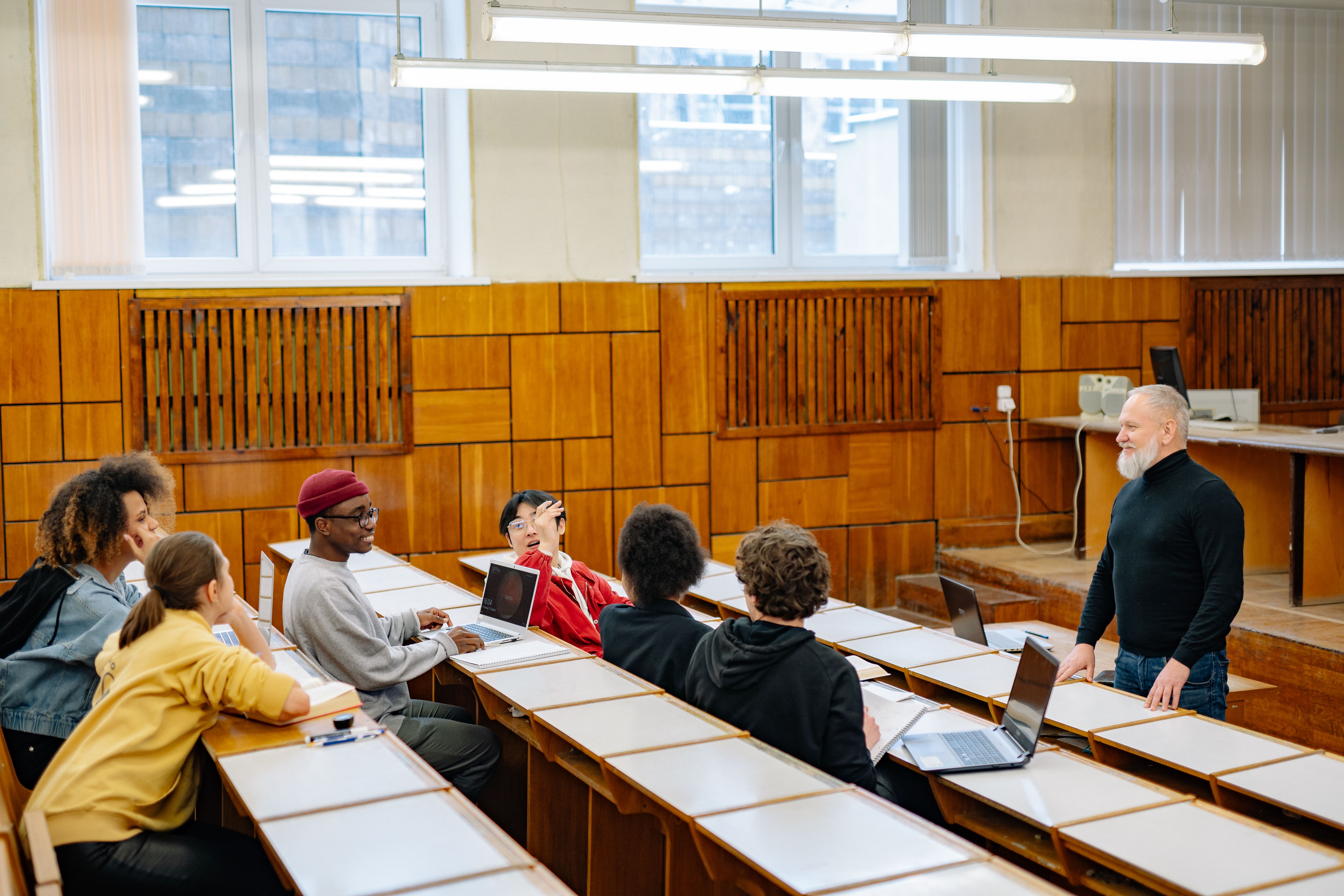 Educators reviewing student-facing digital enrollment and program tools