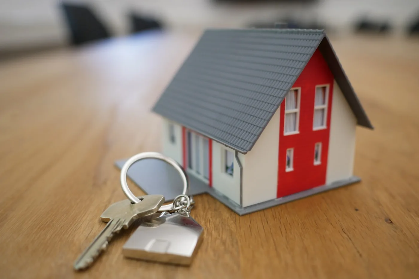 Real estate professionals reviewing property listings and lead dashboards