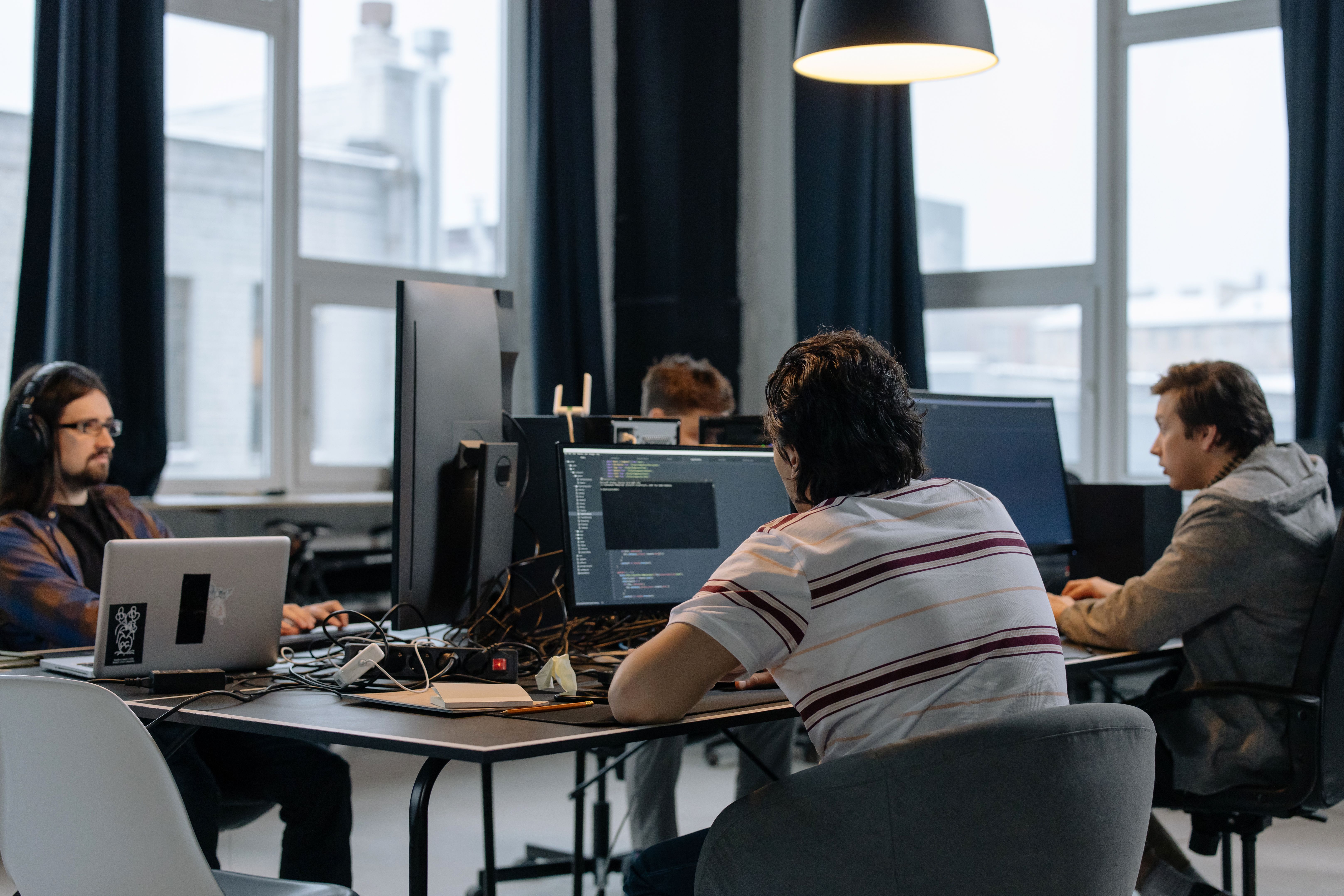 Technology product team reviewing SaaS marketing and pipeline dashboards