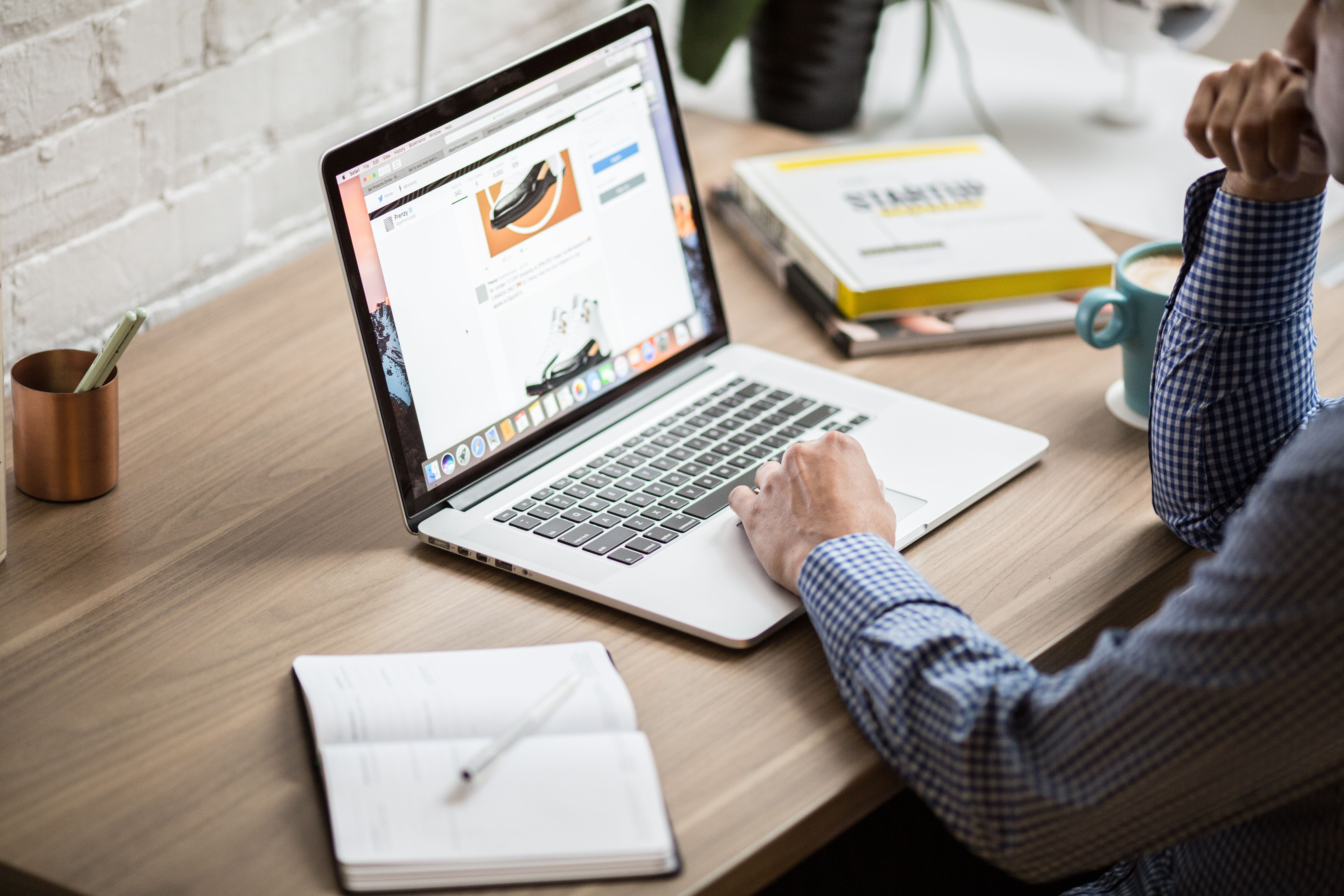 Professional working on a laptop in a modern office
