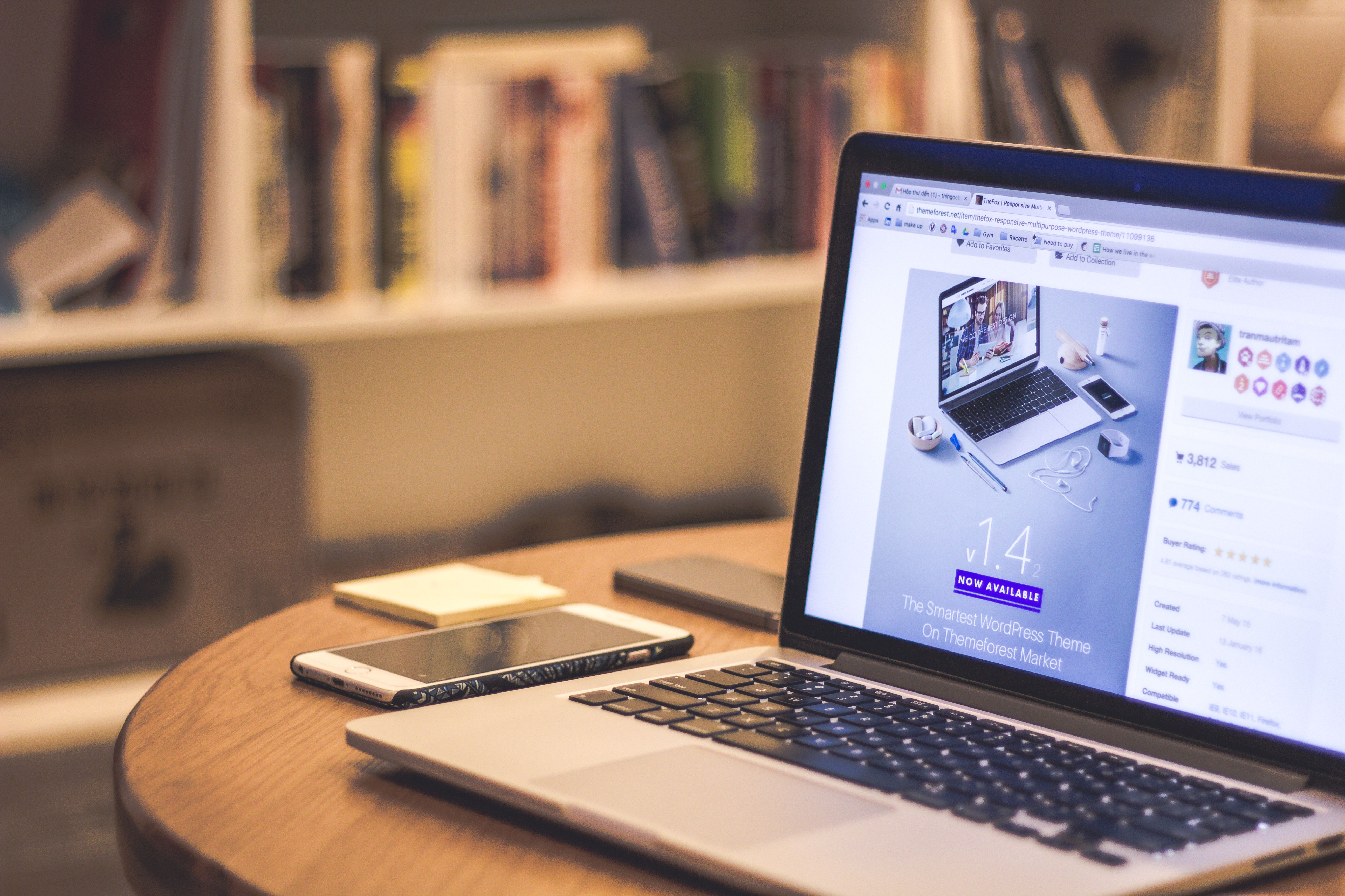 Laptop showing a custom website design on a modern desk