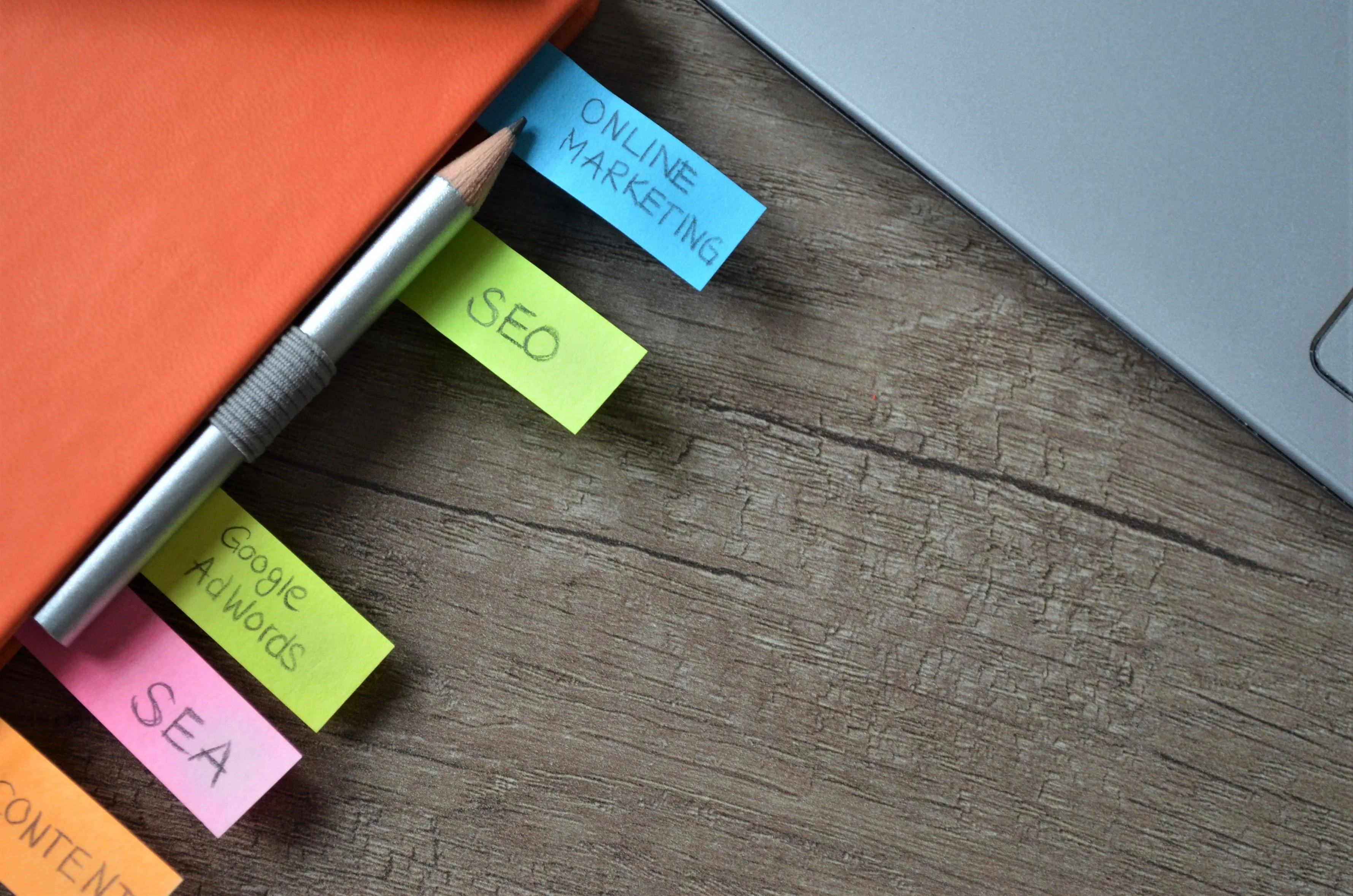 SEO strategy planner with sticky notes on a notebook